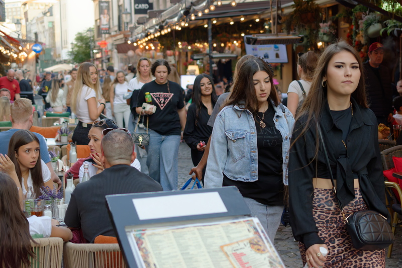 4 - A bustling pedestrian street lined with outdoor cafe terraces and historic buildings in the Old Town Of Bucharest
